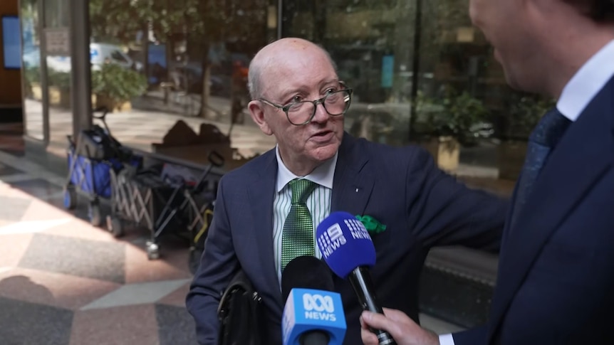 Jones's butler comments outside court after 'slap on the bottom' evidence